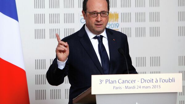 France's President Francois Hollande delivers a speech during a visit at the Ligue Contre le Cancer (League Against Cancer) centre in Paris, March 24, 2015. - Sputnik International