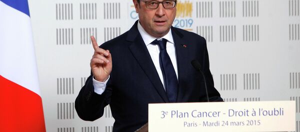 France's President Francois Hollande delivers a speech during a visit at the Ligue Contre le Cancer (League Against Cancer) centre in Paris, March 24, 2015. - Sputnik International