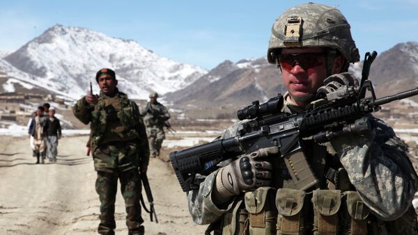 US and Afghan troops check on town of Yawez. - Sputnik International