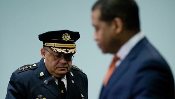 Philadelphia Police Commissioner Charles Ramsey, left, arrive for a news conference Monday, March 23, 2015, in Philadelphia. Poor training has left Philadelphia police officers with the mistaken belief that fearing for their lives alone is justification for using deadly force, the Justice Department said Monday in a review of the city’s nearly 400 officer-involved shootings since 2007 - Sputnik International