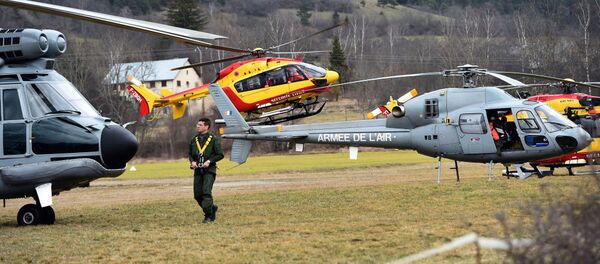 Helicopters of the French Air Force (back) and civil security services are seen in Seyne, south-eastern France, on March 24, 2015, near the site where a Germanwings Airbus A320 crashed in the French Alps. Helicopters of the French Air Force (back) and civil security services are seen in Seyne, south-eastern France, on March 24, 2015, near the site where a Germanwings Airbus A320 crashed in the French Alps. - Sputnik International