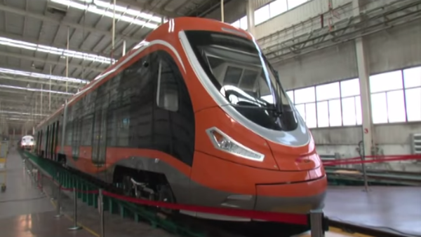 The tram made its debut in the Chinese city of Qingdao last week, and is expected to hit the streets of China later this year. - Sputnik International