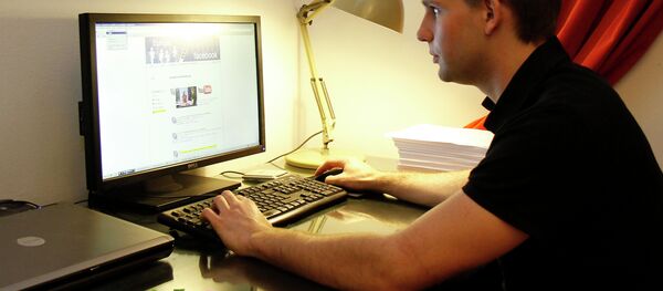 Austrian student Max Schrems sits at his computer, in Vienna, Austria. Austrian student Max Schrems sits at his computer, in Vienna, Austria. - Sputnik International