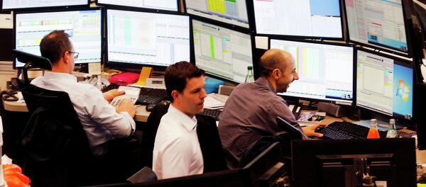 Traders watch their screens when the German stock index DAX reached its highest level in history with more than 12 000 points in Frankfurt, Germany, Monday, March 16, 2015 Traders watch their screens when the German stock index DAX reached its highest level in history with more than 12 000 points in Frankfurt, Germany, Monday, March 16, 2015 - Sputnik International