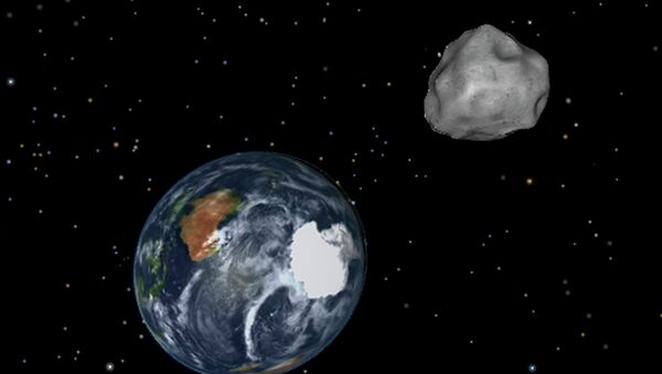 This image provided by NASA/JPL-Caltech shows a simulation of asteroid 2012 DA14 approaching from the south as it passes through the Earth-moon system on Friday, Feb. 15, 2013 - Sputnik International