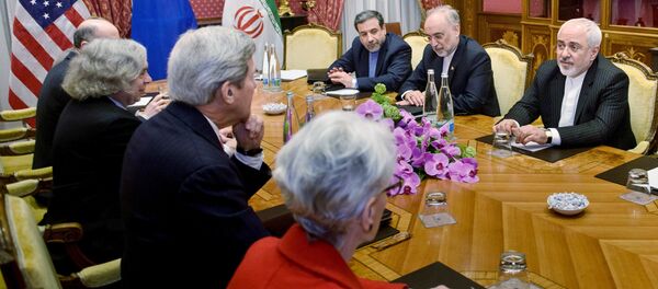 (From left) Robert Malley, of the US National Security Council, US Secretary of Energy Ernest Moniz, US Secretary of State John Kerry, US Under Secretary for Political Affairs Wendy Sherman, Iranian Deputy Foreign Minister Abbas Araghchi, Head of Iranian Atomic Energy Organisation Ali Akbar Salehi and Iranian Foreign Minister Javad Zarif wait for a meeting at the Beau Rivage Palace Hotel March 27, 2015 in Lausanne, Switzerland (From left) Robert Malley, of the US National Security Council, US Secretary of Energy Ernest Moniz, US Secretary of State John Kerry, US Under Secretary for Political Affairs Wendy Sherman, Iranian Deputy Foreign Minister Abbas Araghchi, Head of Iranian Atomic Energy Organisation Ali Akbar Salehi and Iranian Foreign Minister Javad Zarif wait for a meeting at the Beau Rivage Palace Hotel March 27, 2015 in Lausanne, Switzerland - Sputnik International