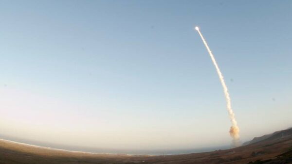 An image provided by Vandenberg Air Force Base shows an unarmed Minuteman III intercontinental ballistic missile being launched during an operational test Wednesday May 22, 2013, from Launch Facility-4 on Vandenberg AFB, Calif - Sputnik International