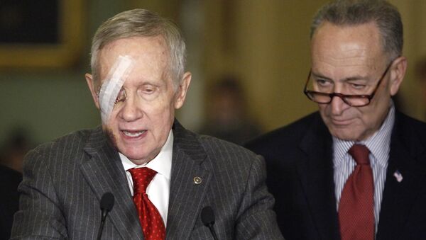 US Senate Minority Leader Harry Reid  (L) and Sen. Charles Schumer talk to the media after a weekly Senate party caucus luncheon on Capitol Hill in Washington, in this February 10, 2015 - Sputnik International