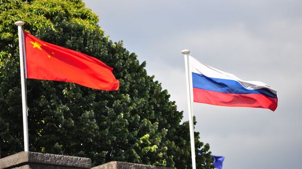 Chinese and Russian flags - Sputnik International
