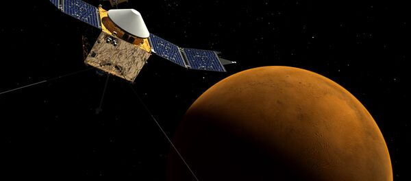 This artist's concept shows the MAVEN spacecraft orbiting Mars. This artist's concept shows the MAVEN spacecraft orbiting Mars. - Sputnik International