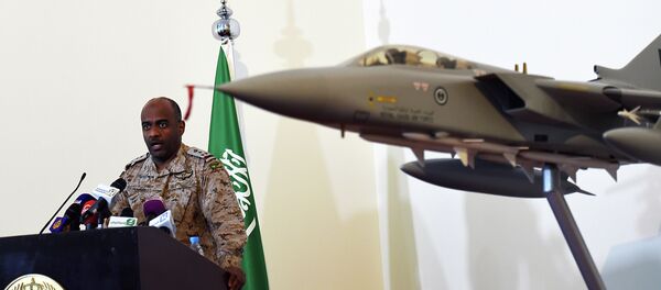 Saudi Brigadier General Ahmed Asiri, spokesman of the Saudi-led coalition forces, speaks to the media next to a replica of a Tornado fighter jet, at the Riyadh airbase in the Saudi capital on March 26, 2014 Saudi Brigadier General Ahmed Asiri, spokesman of the Saudi-led coalition forces, speaks to the media next to a replica of a Tornado fighter jet, at the Riyadh airbase in the Saudi capital on March 26, 2014 - Sputnik International