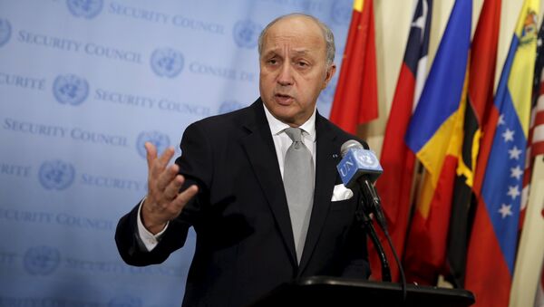 French Foreign Minister Laurent Fabius speaks to members of the media as he stands outside the United Nations Security Council chambers - Sputnik International