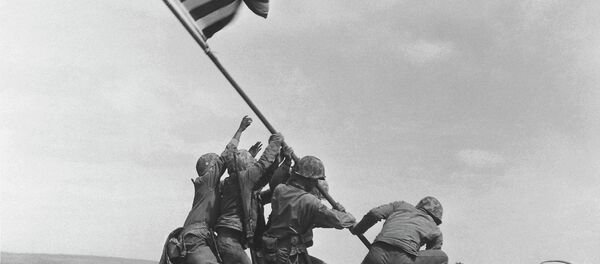 US Marines of the 28th Regiment, 5th Division, raise the American flag atop Mt. Suribachi, Iwo Jima US Marines of the 28th Regiment, 5th Division, raise the American flag atop Mt. Suribachi, Iwo Jima - Sputnik International