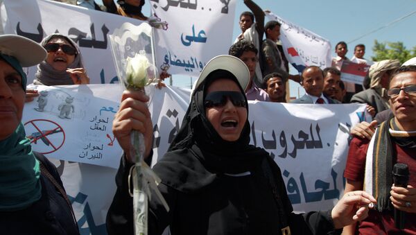 A Yemeni woman shouts slogans during a rally against Saudi-led coalition airstrikes against Huthi rebels on March 29, 2015 in Sanaa - Sputnik International