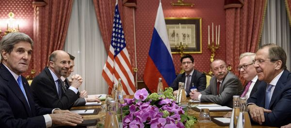 US Secretary of State John Kerry, left, and Russian Foreign Minister Sergey Lavrov, right, wait for the start of a meeting at the Beau Rivage Palace Hotelin Lausanne, Switzerland US Secretary of State John Kerry, left, and Russian Foreign Minister Sergey Lavrov, right, wait for the start of a meeting at the Beau Rivage Palace Hotelin Lausanne, Switzerland - Sputnik International