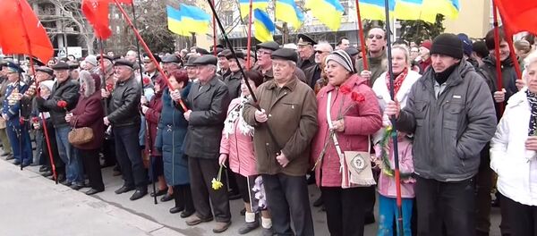A rally in the southern Ukrainian city of Nikolaev commemorating the 71st anniversary of the freeing of the city from Nazi occupation became heated after a speech by a soldier in the Ukrainian armed forces prompted an angry outcry from residents. A rally in the southern Ukrainian city of Nikolaev commemorating the 71st anniversary of the freeing of the city from Nazi occupation became heated after a speech by a soldier in the Ukrainian armed forces prompted an angry outcry from residents. - Sputnik International