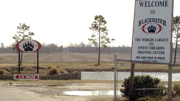In this Feb. 20,2004 file photo, signs welcome visitors to the private North Carolina-based security company Blackwater USA's headquarters near Moyock, N.C. - Sputnik International