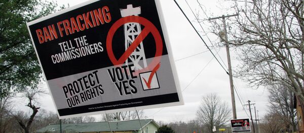 In this March 12, 2014 file photo, a sign near the Johnson County courthouse in Vienna, Ill., urges the county's voters to defeat a ballot referendum on the drilling practice called hydraulic fracturing or fracking In this March 12, 2014 file photo, a sign near the Johnson County courthouse in Vienna, Ill., urges the county's voters to defeat a ballot referendum on the drilling practice called hydraulic fracturing or fracking - Sputnik International