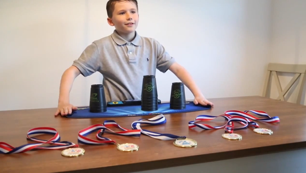 Superb Sleight of Hand: 10-Year-Old UK Speed Stacking Champ Shows His Skill - Sputnik International