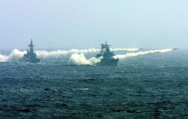 Two warships of the South China Sea Fleet of the Chinese Navy fire missiles during a competitive training. Two warships of the South China Sea Fleet of the Chinese Navy fire missiles during a competitive training. - Sputnik International