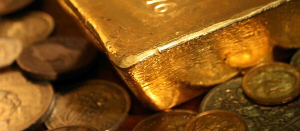 Bullion bar in sea of coin Bullion bar in sea of coin - Sputnik International