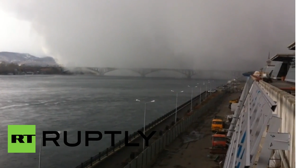 Winter’s Return: Snow Cloud Swallows Russian City - Sputnik International