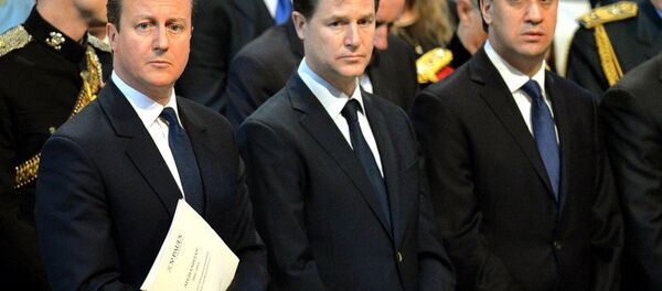 Britain's Prime Minister David Cameron, left, Deputy Prime Minister Nick Clegg, center, and Labour party leader Ed Miliband - Sputnik International