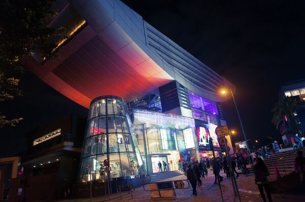 The Peak Tower is a leisure and shopping complex located at Victoria Gap, near the summit of Victoria Peak on Hong Kong Island, Hong Kong. The Peak Tower is a leisure and shopping complex located at Victoria Gap, near the summit of Victoria Peak on Hong Kong Island, Hong Kong. - Sputnik International