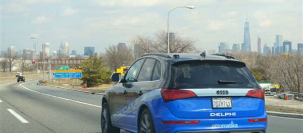 The Delphi Corp. autonomous car approaches New York City, its final destination of a 3,400-mile road trip across the United States. - Sputnik International