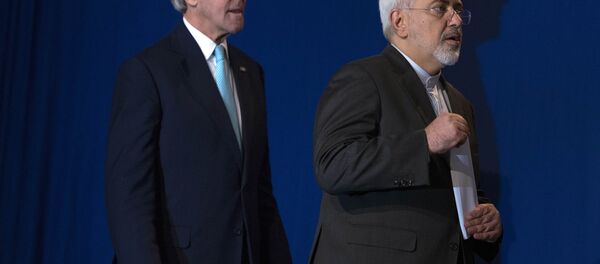 US Secretary of State John Kerry, left, and Iranian Foreign Minister Javad Zarif arrive to deliver a statement, at the Swiss Federal Institute of Technology, or Ecole Polytechnique Federale De Lausanne, in Lausanne, Switzerland, Thursday, April 2, 2015 US Secretary of State John Kerry, left, and Iranian Foreign Minister Javad Zarif arrive to deliver a statement, at the Swiss Federal Institute of Technology, or Ecole Polytechnique Federale De Lausanne, in Lausanne, Switzerland, Thursday, April 2, 2015 - Sputnik International