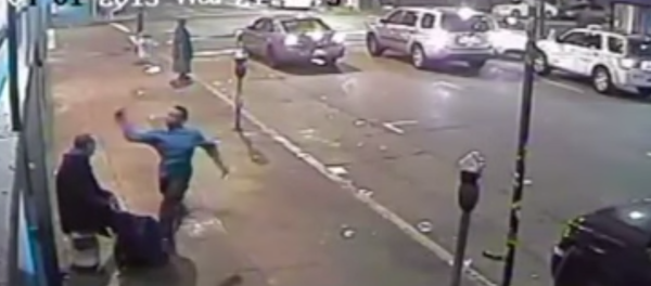 “Pulls out a blunt metal object and, almost like a baseball swing, swings it across the left side of the victim’s head, knocking him unconscious.” - Sputnik International