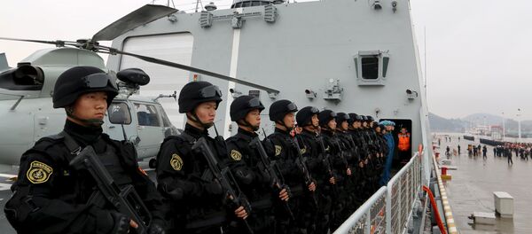 Soldiers of the Chinese People's Liberation Army stand on the deck before a fleet sets out for Aden, Yemen, from Zhoushan, Zhejiang province, April 3, 2015. Soldiers of the Chinese People's Liberation Army stand on the deck before a fleet sets out for Aden, Yemen, from Zhoushan, Zhejiang province, April 3, 2015. - Sputnik International
