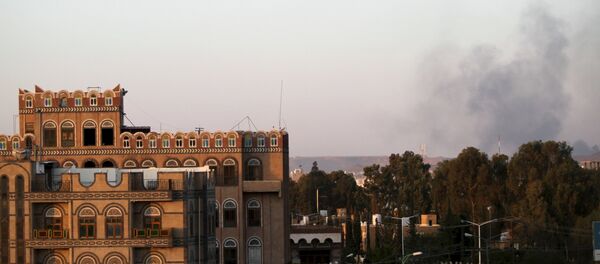 Smoke billows near military barracks in the Jabal al-Jumaima mountain following an air strike near Sanaa Smoke billows near military barracks in the Jabal al-Jumaima mountain following an air strike near Sanaa - Sputnik International