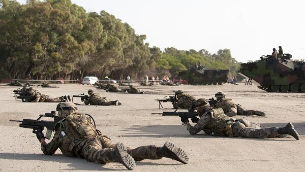 Spanish Navy Marines take position during a NATO Response Force training exercise. - Sputnik International
