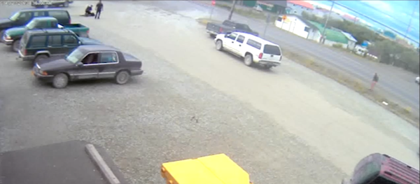 Screen shot from surveillance footage showing a police officer in Alaska repeatedly slamming a man to the ground in a store parking lot during an arrest last summer - Sputnik International