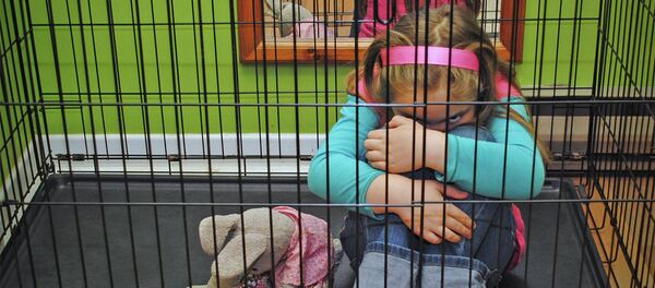 Caged child - Sputnik International