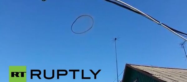 Truth Is Out There: Mysterious Black Ring Spotted in Kazakhstan Skies Truth Is Out There: Mysterious Black Ring Spotted in Kazakhstan Skies - Sputnik International