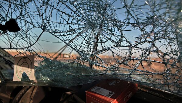 Windscreen of a car after an air strike in Ras Lanuf - Sputnik International