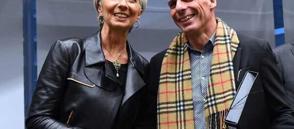Greek Finance Minister Yanis Varoufakis (R) shakes hands with International Monetary Fund (IMF) Director Christine Lagarde during an emergency Eurogroup finance ministers meeting at the European Council in Brussels on February 11, 2015 Greek Finance Minister Yanis Varoufakis (R) shakes hands with International Monetary Fund (IMF) Director Christine Lagarde during an emergency Eurogroup finance ministers meeting at the European Council in Brussels on February 11, 2015 - Sputnik International