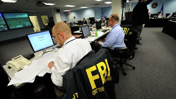 Agents from the FBI and other law enforcement agencies work at a 24-hour operations center at FBI headquarters, Monday, May 3, 2010, in the Chelsea section of New York - Sputnik International