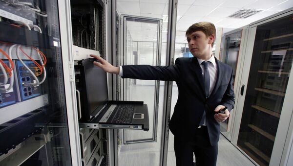 A technical support engineer working at the new air traffic control center in Kaliningrad's Khrabrovo Airport - Sputnik International