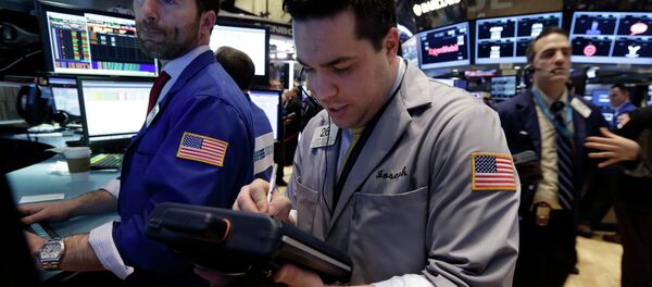 Trader Joseph Lawler, center, works on the floor of the New York Stock Exchange, Thursday, March 5, 2015 Trader Joseph Lawler, center, works on the floor of the New York Stock Exchange, Thursday, March 5, 2015 - Sputnik International