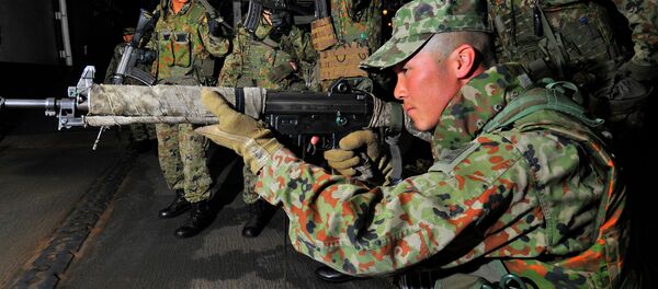 Members of the Japan Ground Self Defense Force conduct small arms weapons training aboard U.S. Navy's amphibious assault ship USS Peleliu. Members of the Japan Ground Self Defense Force conduct small arms weapons training aboard U.S. Navy's amphibious assault ship USS Peleliu. - Sputnik International