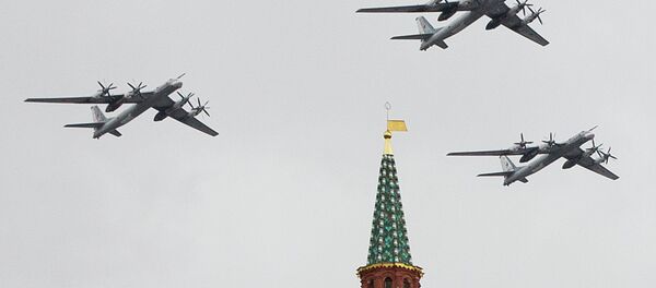 Russian Air Force strategic bombers, Tu-95, fly in formation over Red Square. Russian Air Force strategic bombers, Tu-95, fly in formation over Red Square. - Sputnik International