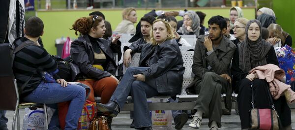 People wait in the departure lounge at Sanaa International Airport, where foreigners are being evacuated from Yemen People wait in the departure lounge at Sanaa International Airport, where foreigners are being evacuated from Yemen - Sputnik International