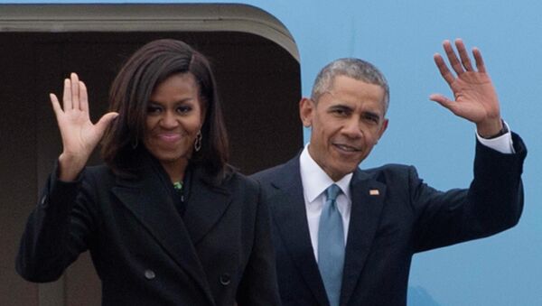 US President Barack Obama (R) and First Lady Michelle Obama (L) - Sputnik International