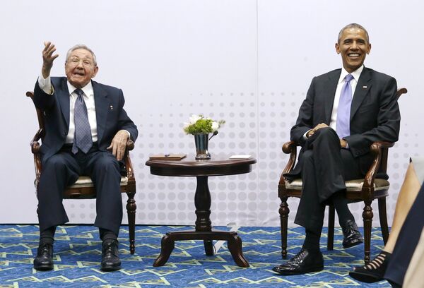 Cuba's President Raul Castro gestures to journalists that he is not taking questions as he and US President Barack Obama hold a bilateral meeting during the Summit of the Americas in Panama City, Panama - Sputnik International
