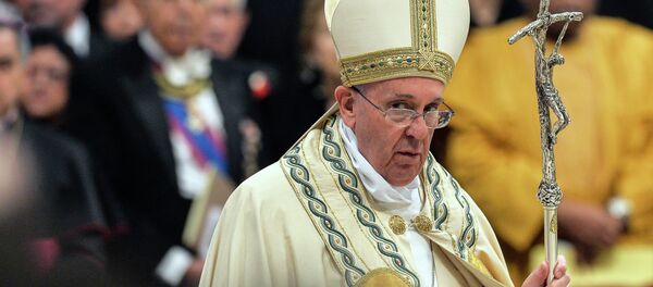 Pope Francis leaves after celebrating a mass of First Vespers in St Peter Basilica at the Vatican, on April 11, 2015 Pope Francis leaves after celebrating a mass of First Vespers in St Peter Basilica at the Vatican, on April 11, 2015 - Sputnik International