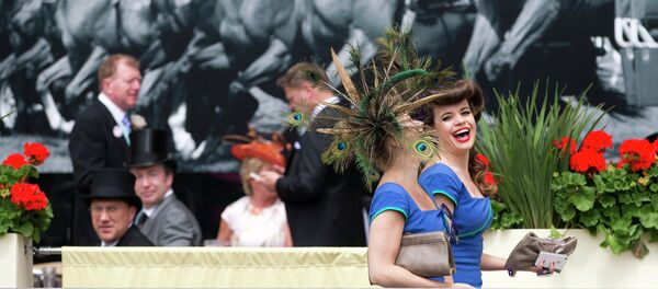 Two members of a choral group laugh as they walk near the parade ring on the third day of the Royal Ascot horse racing meeting, which is traditionally known as Ladies Day, at Ascot, England, Thursday, June, 19, 2014 Two members of a choral group laugh as they walk near the parade ring on the third day of the Royal Ascot horse racing meeting, which is traditionally known as Ladies Day, at Ascot, England, Thursday, June, 19, 2014 - Sputnik International
