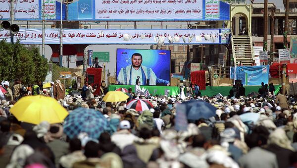 Yemeni Shiite supporters of the Huthi movement watch the movement leader Abdul-Malik al-Houthi deliver a televised speech during Eid al-Ghadir celebrations in the capital Sanaa. fILE PHOTO - Sputnik International